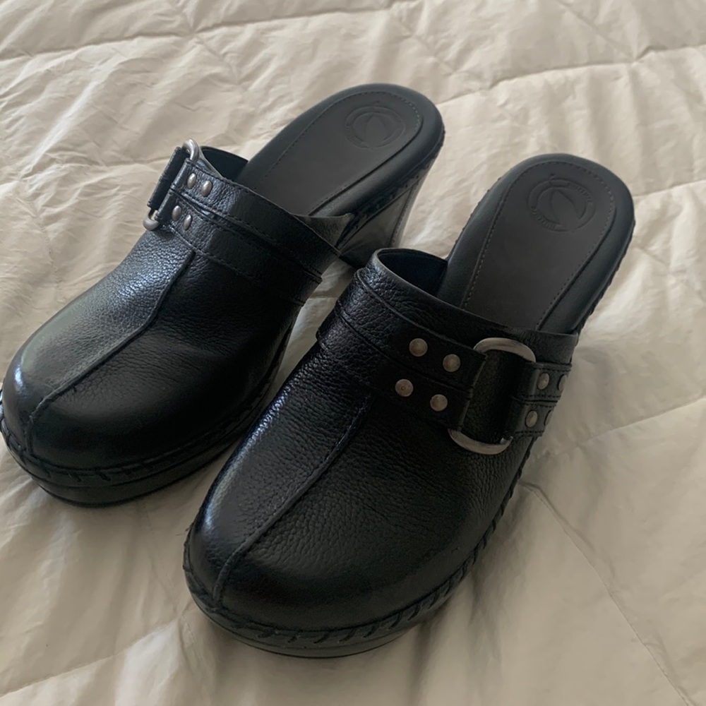 Leather clogs , never worn . Excellent condition!